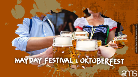 people celebrating at a table drinking beer in Germany at the Oktoberfest