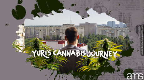 Yuri from his terrace with some cannabis plants observes the Belarusian city